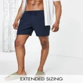 ASOS DESIGN swim shorts in mid length in navy