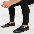 ASOS DESIGN loafers in black faux leather with tassel detail