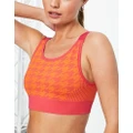 ASOS 4505 Seamless jacquard medium support sports bra in pink