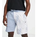 Puma marble print colourblock shorts in blue - exclusive to ASOS