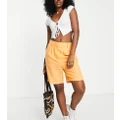 Only exclusive linen city shorts in orange