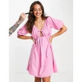 Vila mini dress with cut out in bright pink