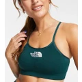 The North Face Training seamless performance sports bra in green Exclusive at ASOS