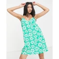 Monki strappy mini dress in green hibiscus floral print