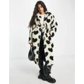 Pieces longline faux fur coat in black & white heart print-Multi