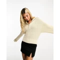 Monki high neck quarter zip knitted sweater in cream-Neutral