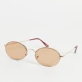 ASOS DESIGN 70s round sunglasses with light brown lens in gold