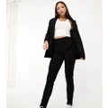 ASOS DESIGN Tall jersey tapered suit pants in black