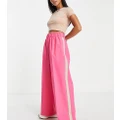 ASOS DESIGN Petite elastic waist side stripe pants in pink with stone stripe