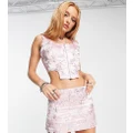 Reclaimed Vintage low rise mini skirt in pink jacquard