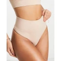 Spanx Seamless contouring thong in beige-Neutral