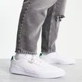 Puma Caven sneakers in white and green
