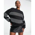 ASOS DESIGN sweatshirt with crystal hotfix stripes in black