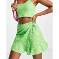 Noisy May wrap mini skirt in green & pink floral