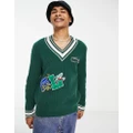 Lacoste Holiday v neck relaxed fit stripe jumper in green