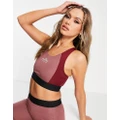 The North Face Training Mountain Athletics medium support sports bra in pink