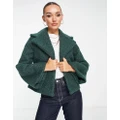 Unreal Fur Madam Butterfly jacket in green