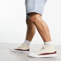 Converse Chuck Taylor All Star sneakers in off white and red
