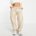 Pull & Bear mid waist tie detail oversized cargo pants in stone-Brown