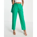 Monki mix and match tailored pants in green (part of a set)
