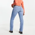 Free People low rise slim boot cut jeans in light blue