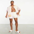 ASOS DESIGN swim shorts in short length in rainbow bandana print (part of a set)-Multi
