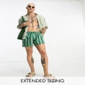ASOS DESIGN swim shorts in short length in green stripe-Multi