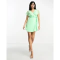 ASOS DESIGN wrap flutter sleeve mini dobby tea dress in apple green