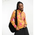 The North Face Glacier 1/4 zip oversized fleece in yellow flower print Exclusive at ASOS