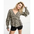 New Look v neck ruffle blouse in zebra print-Black