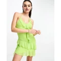 Glamorous halter neck mesh mini dress with asymmetric hem detail in lime-Green