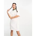 Lacoste polo shirt dress in white with contrast collar