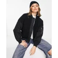 Urban Classics oversized sherpa mix bomber jacket in black