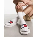 Tommy Jeans flag logo pool sliders in white-Pink
