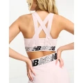 New Balance Relentless sports bra in light pink