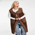 Noisy May longline mixed quilted and teddy vest in brown