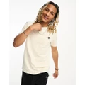 Timberland Dunstan River left chest logo t-shirt in off white