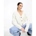 Vila button through cable knit cardigan in cream-White
