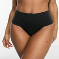 Spanx Undie-tectable smoothing lingerie thong in black