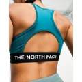 The North Face Training Tech mid support sports bra in teal-Blue