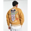 Obey Time varsity bomber jacket in light brown with chest and back embroidery