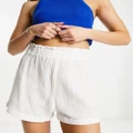 Monki high waisted pull on shorts in off white
