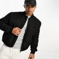 Calvin Klein signature quilted bomber jacket in black