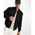 Calvin Klein signature quilted bomber jacket in black