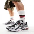 Asics Gel-Nimbus 9 trainers in black grey and silver