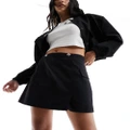 Morgan a line mini skirt with hardware detail in black