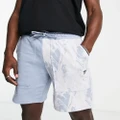 Puma marble print colourblock shorts in blue - exclusive to ASOS