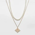 ALDO 2 pack of necklaces with faux pearl and icon pendant in gold
