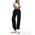 Monki trackies with cuffed hem in black
