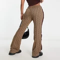 Lacoste straight fit drawstring pants in brown with all over print